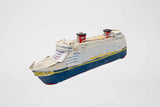 A handmade paper sculpture of a Disney-style cruise ship shown against a plain white background. The ship has a dark blue hull, white upper decks, rows of drawn windows, yellow accents, and two red-and-black smokestacks.