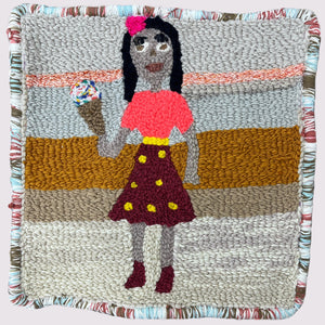 This textile artwork features a woven depiction of a figure holding an ice cream cone, crafted with various yarn colors and textures that create a layered, tactile composition. The piece uses bold color contrasts and textured stitching to delineate forms, adding depth and character to the simple scene, while the bordered edges provide a finished, framed appearance.