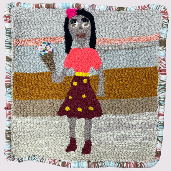 This textile artwork features a woven depiction of a figure holding an ice cream cone, crafted with various yarn colors and textures that create a layered, tactile composition. The piece uses bold color contrasts and textured stitching to delineate forms, adding depth and character to the simple scene, while the bordered edges provide a finished, framed appearance.