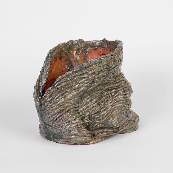 Continuous Touch by Ericka Lopez features 21 coiled ceramic vessels in a variety of sizes and colors. Ranging from bright, fiery red to cool, deep purple, the highly tactile works are glazed with both matte and glossy finishes. While each is unique, this body of work is unified by organic, flowing contours that render distinct silhouettes on all sides of the pieces. The artist encourages you to touch lightly for the most comprehensive experience.