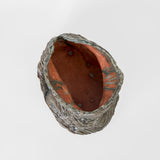 Continuous Touch by Ericka Lopez features 21 coiled ceramic vessels in a variety of sizes and colors. Ranging from bright, fiery red to cool, deep purple, the highly tactile works are glazed with both matte and glossy finishes. While each is unique, this body of work is unified by organic, flowing contours that render distinct silhouettes on all sides of the pieces. The artist encourages you to touch lightly for the most comprehensive experience.