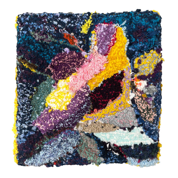 This textile artwork features a densely textured and vibrant arrangement of wool, yarn, and fabric, creating an abstract, organic composition of colors. Rich purples, yellows, blues, and pinks blend and overlap in a patchwork of loops and knots, showcasing the artist's attention to texture and depth in a tactile, almost sculptural format.