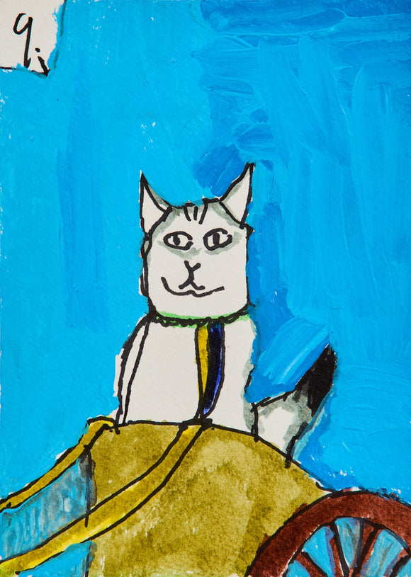 A painting of a whimsical gray-striped cat, outlined in black and wearing a green collar, sits in a golden cart with a single wooden wheel peeking out. Against a brilliantly blue background, the cat’s calm, symmetrical face and upright ears give the painting a stately charm, reminiscent of a feline carriage ride into imagination.