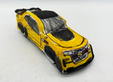 Angel Rodriguez - Untitled (yellow and black race car)
