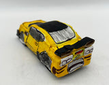 Angel Rodriguez - Untitled (yellow and black race car)