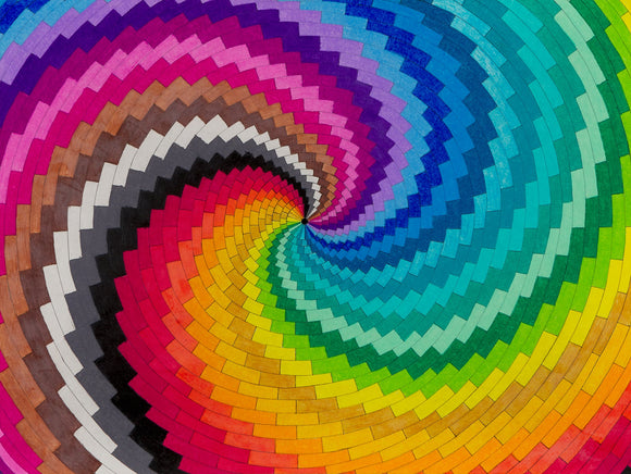 ‘The Rainbow of Spinning Spiral’ is a colored pencil and pen piece by Marlena Arthur. Measuring 18 x 24”, this work is a colorful spiral pattern composed of many rectangles drawn in every color of the rainbow. The rectangles curve and rotate as they lead to the center of the piece in a spiral formation. 