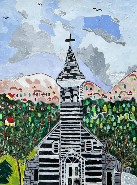 This 24 by 18-inch acrylic painting titled “The Church in the Mountain” depicts a black-and-white striped church centered in front of a peaceful scene. The background features a landscape with small houses nestled among green trees and pink mountains underneath a soft blue sky filled with voluminous white and grey clouds. The dominant colors are white and gray, with accents of dark green. 